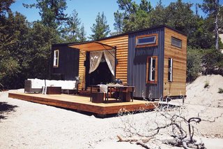 The home sits amid a grove of redwoods. 