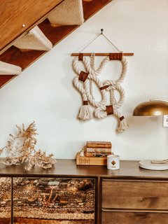 Thomas pairs handmade goods with antique and natural elements to instill a cozy, yet artsy aesthetic.