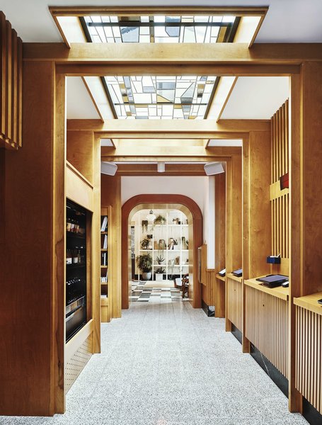 A hallway of kiosks allows guests to easily check in, get key cards, and update reservations.