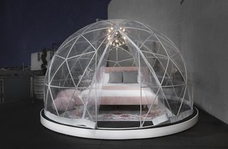 Sleep under the stars in a plush, queen-sized bed, while also enjoying all the creature comforts of a private, top-floor suite. 