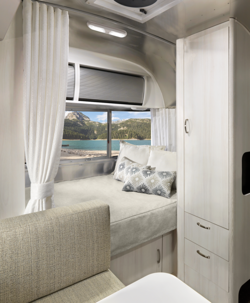 The trailer is available in four lengths (16-, 19-, 20-, and 22 feet) and all include a dedicated bed with mattress that’s made to fit the curve of the Airstream, and a privacy curtain.