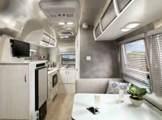 Interiors are centered around neutral tones that allow natural light to bounce through the space. Two soothing palettes are available including "Dune" and "Ocean," both with Performatex® fabric seating.