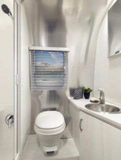 The 20-foot and 22-foot models offer more counter space in larger kitchens, and the 22-foot even has a bathroom that spans the entire rear of the trailer. 