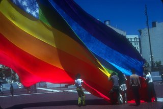 Baker and volunteers raise the original flag in 1978.