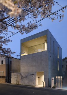 A view of the exterior by night. 