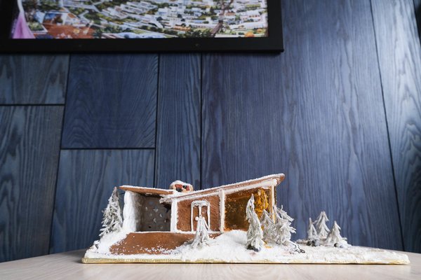Chef Anthony Strong&rsquo;s gingerbread ski cabin sports a butterfly roof.