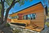 Modern home with Exterior, House Building Type, and Wood Siding Material. Front Facade Photo of Fenlon House