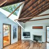 Modern home with Living Room, Dark Hardwood Floor, and Wood Burning Fireplace. Living Room Photo 4 of Fenlon House
