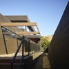Modern home with Exterior, Wood Siding Material, Flat RoofLine, and House Building Type. View of Front Photo 2 of The Brucato House