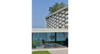 Modern home with Field, Concrete Patio, Porch, Deck, Planters Patio, Porch, Deck, Concrete Siding Material, Vinyl Siding Material, House Building Type, Dining Room, Bench, Ceiling Lighting, and Accent Lighting. The masharbiya and the lake Photo 4 of House on the Lake