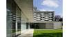The signiture latticework perched ontop of the entry Photo 2 of House on the Lake modern home