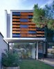 Modern home with House Building Type, Metal Roof Material, Metal Siding Material, Windows, Concrete Siding Material, Wood Siding Material, Sliding Window Type, Picture Window Type, Casement Window Type, and Metal. the modern facade Photo 9 of Seven