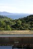 Modern home with Exterior, Flat RoofLine, House Building Type, Beach House Building Type, Concrete Siding Material, Green Roof Material, Stone Siding Material, and Wood Siding Material. Overlooking the sea. Photo 13 of La Mira Ra