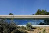 Modern home with Exterior, Concrete Siding Material, Stone Siding Material, House Building Type, Flat RoofLine, Green Roof Material, and Glass Siding Material. A concrete box. Photo 15 of La Mira Ra