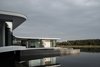 Modern home with Exterior, Flat RoofLine, House Building Type, Green Roof Material, and Glass Siding Material. Curves Photo 2 of White Snake house