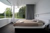 Modern home with Recessed Lighting and Pendant Lighting. The bedroom Photo 12 of White Snake house