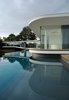 Modern home with Outdoor, Trees, Infinity Pools, Tubs, Shower, Large Pools, Tubs, Shower, Large Patio, Porch, Deck, Concrete Pools, Tubs, Shower, Back Yard, and Wood Patio, Porch, Deck. The infinity pool Photo 4 of White Snake house