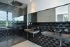 Modern home with Concrete Floor, Ceiling Lighting, and Recessed Lighting. The bathroom Photo 13 of White Snake house