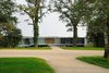 Modern home with Outdoor, Shrubs, Woodland, Grass, Front Yard, and Trees. The frontyard Photo 3 of White Snake house