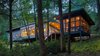 Modern home with Shed RoofLine, House Building Type, Metal Roof Material, and Wood Siding Material. Evening view from forest Photo of Dickerman Residence