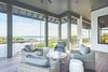 Modern home with Outdoor, Infinity Pools, Tubs, Shower, Concrete Patio, Porch, Deck, Metal Patio, Porch, Deck, Salt Water Pools, Tubs, Shower, Large Patio, Porch, Deck, Wood Patio, Porch, Deck, Decking Patio, Porch, Deck, and Hanging Lighting. 155 Bannerman Beach Lane :: Outdoor Living Space Photo 7 of 155 Bannerman Beach Lane