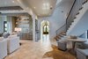 Modern home with Living Room, Chair, Rug Floor, Recessed Lighting, Porcelain Tile Floor, and Bookcase. 155 Bannerman Beach Lane :: Reading Nook + Living Space Photo 13 of 155 Bannerman Beach Lane