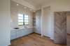 Modern home with Recessed Lighting, Ceiling Lighting, Medium Hardwood Floor, and Garage. 155 Bannerman Beach Lane :: Carriage House Photo 15 of 155 Bannerman Beach Lane