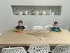 Modern home with Dining Room, Table, Chair, Storage, Recessed Lighting, and Dark Hardwood Floor. The boys eating modern. (2016) Photo 18 of 530 house