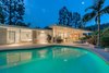 Modern home with Outdoor, Back Yard, Trees, Large Pools, Tubs, Shower, Swimming Pools, Tubs, Shower, Large Patio, Porch, Deck, Decking Patio, Porch, Deck, and Landscape Lighting. Rear at night Photo of Benton Park, AIA Mid Century Modern