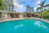 Modern home with Outdoor, Back Yard, Trees, Hardscapes, Large Pools, Tubs, Shower, Plunge Pools, Tubs, Shower, Swimming Pools, Tubs, Shower, Large Patio, Porch, Deck, Decking Patio, Porch, Deck, and Landscape Lighting. Rear day shot with sparkling pool Photo 10 of Benton Park, AIA Mid Century Modern