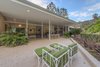 Modern home with Outdoor, Back Yard, Hardscapes, Raised Planters, Large Patio, Porch, Deck, and Decking Patio, Porch, Deck. Rear patio close up mid day Photo 11 of Benton Park, AIA Mid Century Modern