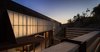 Modern home with Exterior, House Building Type, Metal Roof Material, Metal Siding Material, and Concrete Siding Material. Up-slope Exterior Photo 2 of Crossing Wall House