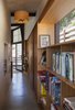 Modern home with Office, Study Room Type, Bookcase, Shelves, and Concrete Floor. Office Hallway Photo 6 of Crossing Wall House
