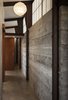 Modern home with Hallway and Concrete Floor. Bedroom Hallway Photo 7 of Crossing Wall House
