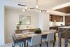 Modern home with Dining Room, Table, Bench, Chair, Bar, Shelves, Ceiling Lighting, Pendant Lighting, Accent Lighting, Recessed Lighting, and Light Hardwood Floor. Dining Room into Kitchen Photo of Pierhouse At Brooklyn Bridge Park Condo