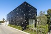Modern home with Exterior, Green Roof Material, House Building Type, and Metal Siding Material. 4016 Tivoli by day Photo 2 of 4016 Tivoli