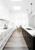 Modern home with Kitchen, Marble Counter, White Cabinet, Wood Cabinet, Dark Hardwood Floor, Medium Hardwood Floor, Stone Slab Backsplashe, Pendant Lighting, Undermount Sink, and Wall Oven. Kitchen Photo 4 of PRK Residence