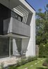 Modern home with Shrubs, Outdoor, Grass, Horizontal Fences, Wall, Back Yard, Gardens, Wood Fences, Wall, Small Patio, Porch, Deck, Garden, and Walkways. Garden Balcony Photo 4 of The Gregory House