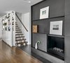 Modern home with Staircase, Wood Railing, and Wood Tread. Kitchen Shelving + Stair + Fireplace Photo 8 of The Gregory House