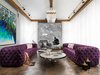 Modern home with Living Room, Sofa, Chair, Coffee Tables, Ceiling Lighting, Track Lighting, Floor Lighting, and Medium Hardwood Floor. Living Room Photo 6 of RSA Residence