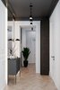 This minimal hallway’s white paint, light wood floor, and mirrored walls make it appear larger than it actually is. Photo 11 of Stalinskaya Building modern home
