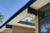 Modern home with House Building Type, Wood Siding Material, Metal Siding Material, Outdoor, Rooftop, and Wood Patio, Porch, Deck. Restrained use of materials and crisp detailing reinforce a modernist feeling exterior. Photo of 328 Koser