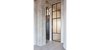 Modern home with Doors, Interior, Metal, and Swing Door Type. Custom steel and glass door & transom. Photo 8 of West Loop Residence