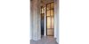 Modern home with Doors, Interior, Metal, and Swing Door Type. Custom steel and glass door & transom - open. Photo 7 of West Loop Residence