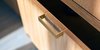 Modern home with Storage Room and Cabinet Storage Type. Detail of custom brass drawer pull. Photo 12 of West Loop Residence