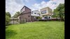 Modern home with Outdoor, Back Yard, Trees, Large Patio, Porch, Deck, Grass, and Wood Fences, Wall. Big backyard. Photo of The Peña Home