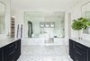 The finest hotel rooms in the world served as inspiration for the owner’s suite, establishing a peaceful retreat. Photo 2 of Retreat at McLean and Mehr Farm modern home
