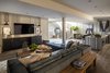 The expansive basement level is connected with the rest of the house via a staircase and optional elevator. Photo 11 of Retreat at McLean and Mehr Farm modern home