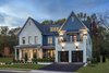 Modern home with Exterior. KTGY designed an unfussy, contemporary farmhouse that is unlike any other in this affluent, traditional market. Photo of Retreat at McLean and Mehr Farm