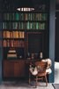 Modern home with Office, Library Room Type, Chair, Bookcase, Desk, Concrete Floor, and Shelves. Custom library. Photo 8 of The Caudill House